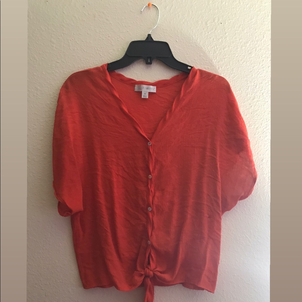 A Red Buttoned Blouse